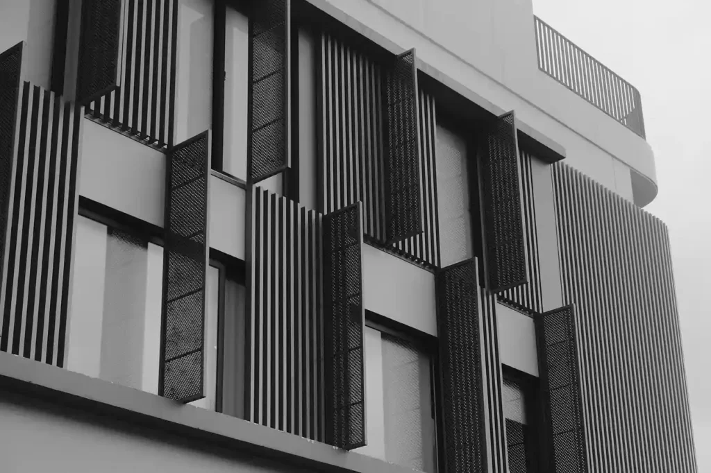 Modern house featuring sleek windows and a bold black exterior, designed and built by Manhattan Contracting, expert general contractors in NYC