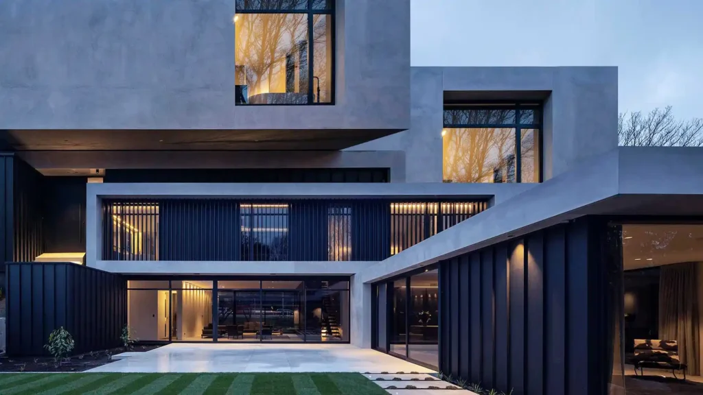 New house with modern design and lighting, built by Manhattan Contracting, offering new construction services in NYC for stylish homes.